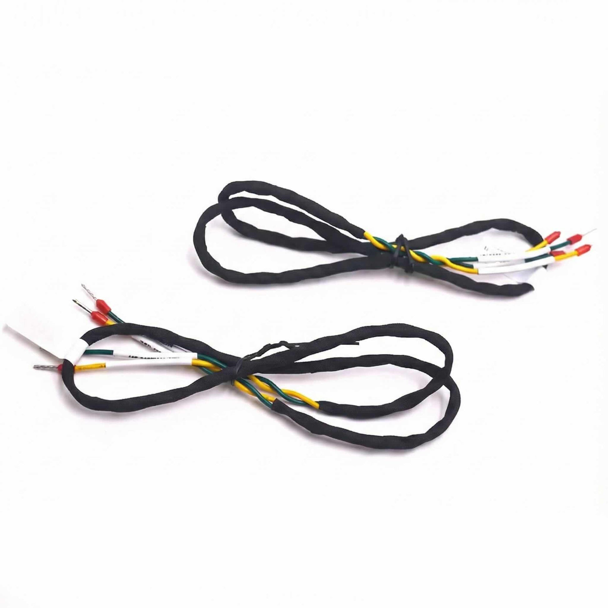 Electrical cable assembly terminated with color-coded ferrule crimps.