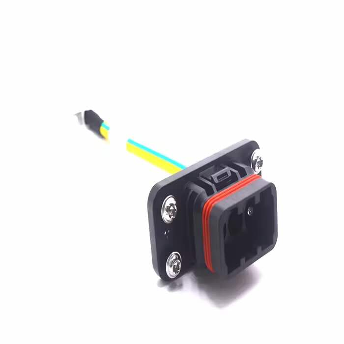 Face view of HDC-65i3m2 heavy-duty battery connector showing orange sealing gasket.