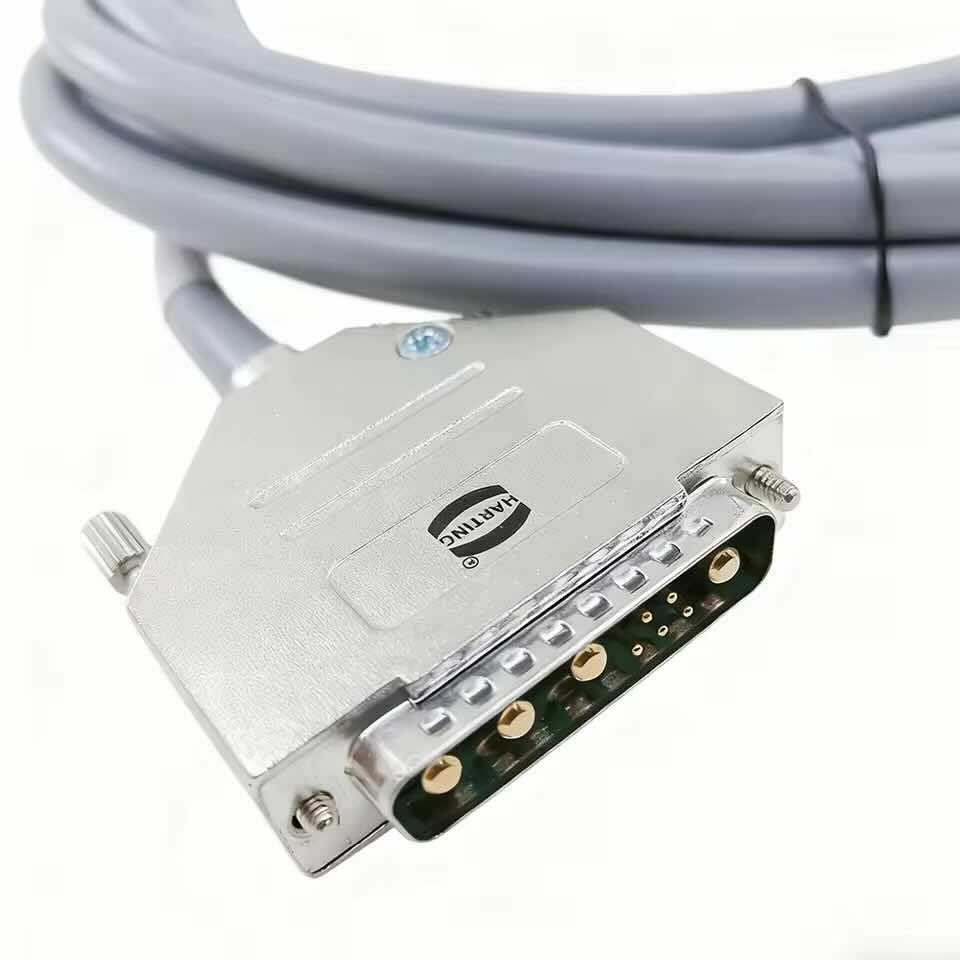 Close-up of gold-plated high-current power contacts on a DB9W4 industrial connector designed for RST motor extension applications.