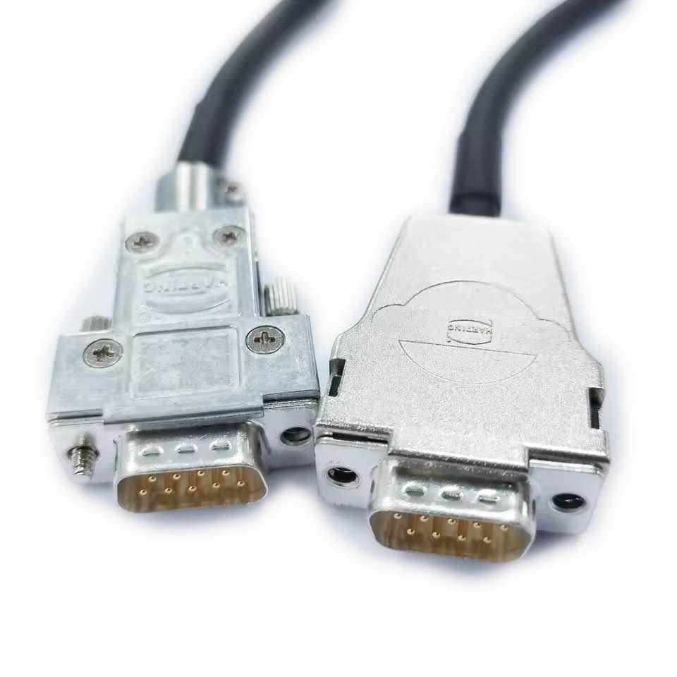 Custom industrial wire harness with two 9-pin D-sub male connectors and high-flex Igus Chainflex cabling for robotic applications.