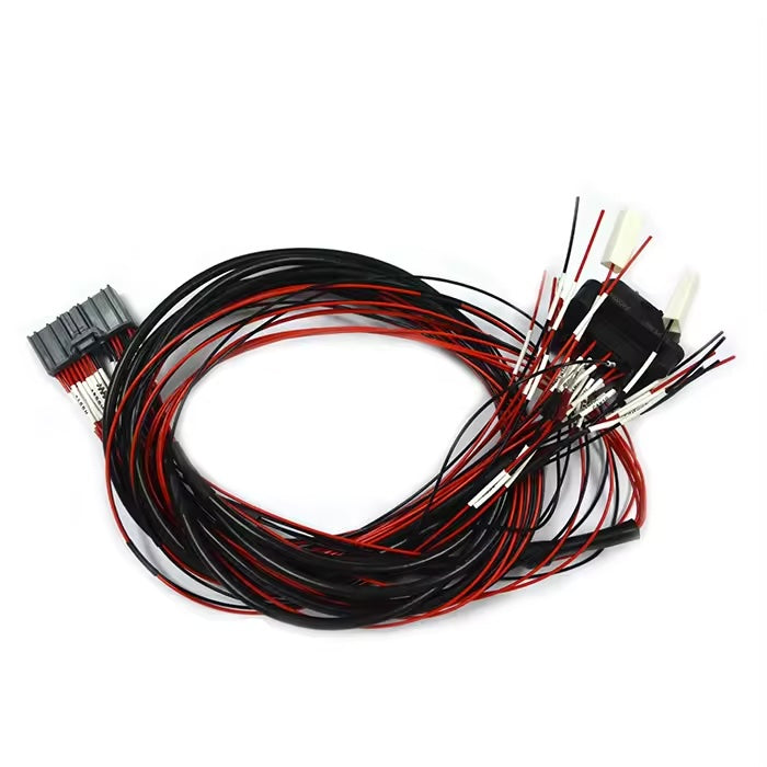 Close-up of JAE MX34036SF1 connector with labeled wires for custom automotive wire harness assembly.