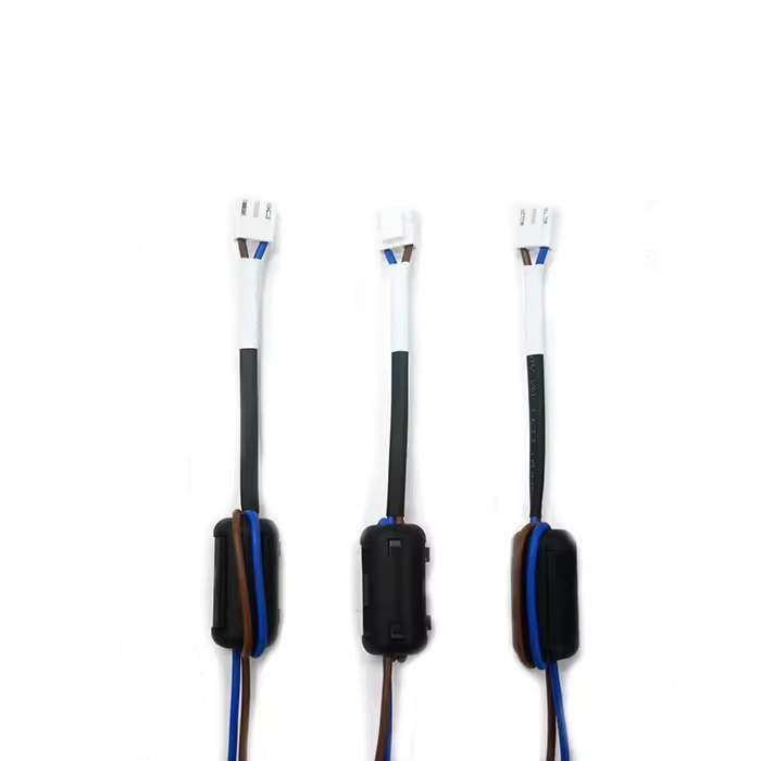 Hybrid electrical cable assembly connecting JST header to 6.35mm Quick Disconnect.