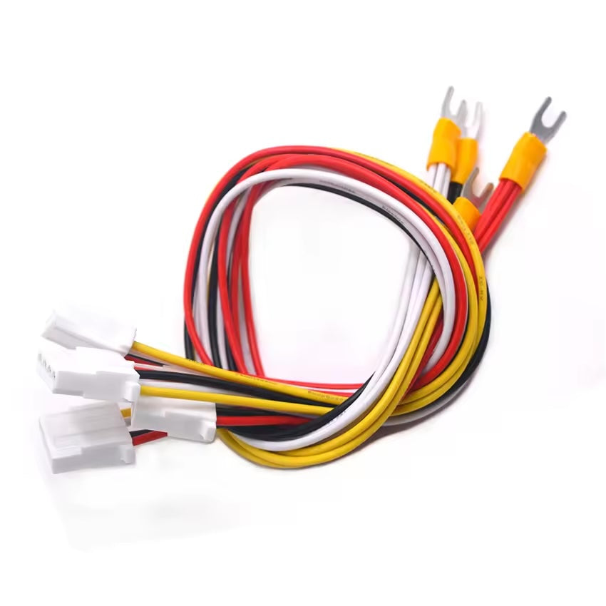 Close-up of 2x2P MX3.0 connectors and precision-crimped spade terminals for industrial power distribution.