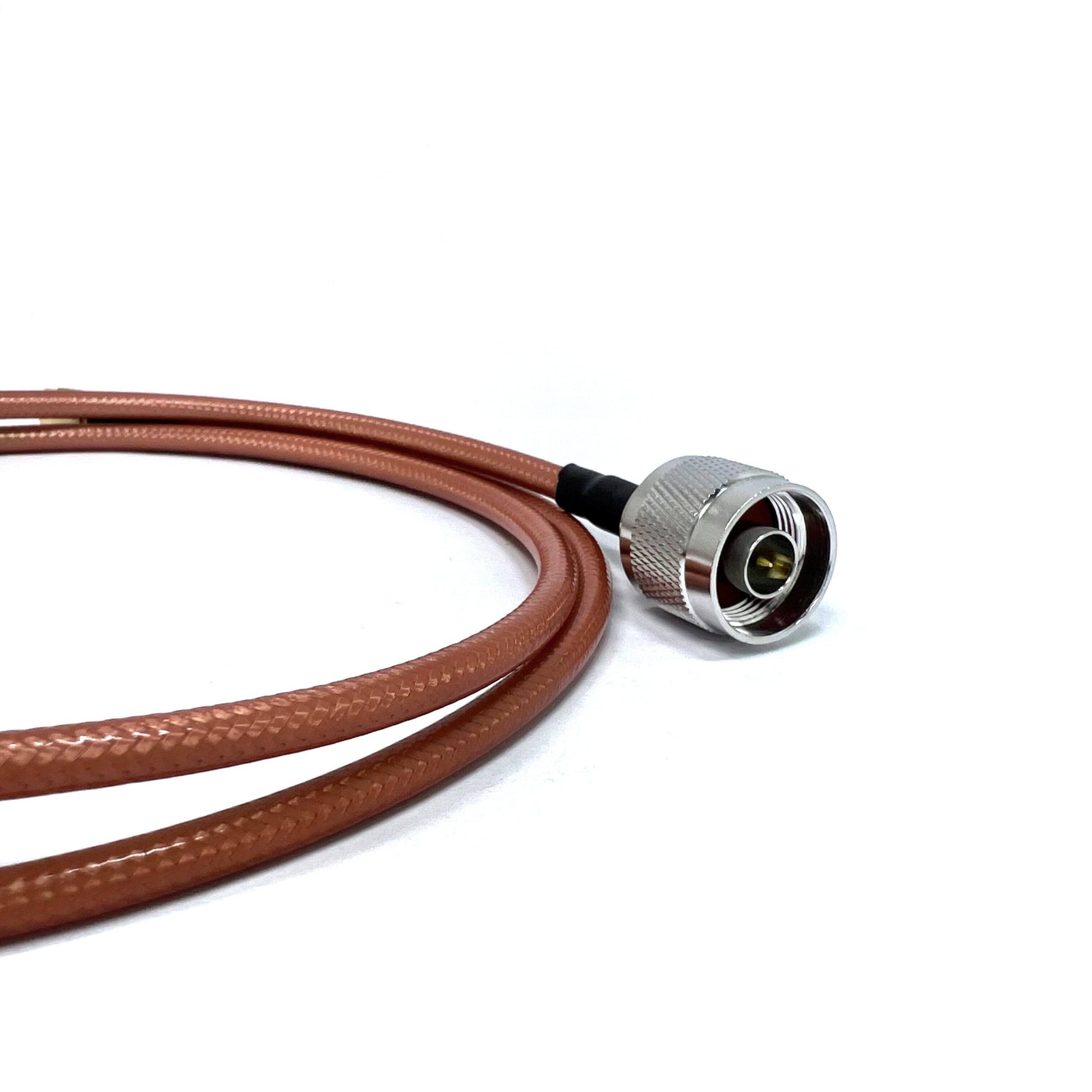 N-Type male to SMA male RG142 RF coaxial cable assembly, N-type male plug view