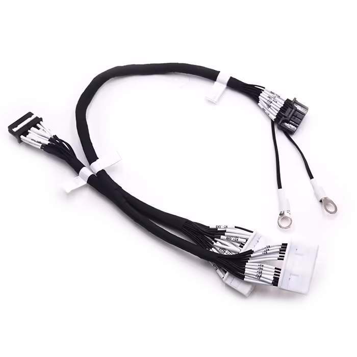 Close-up of UL1332 24AWG battery harness showing white labels for NTC and Ground connections.