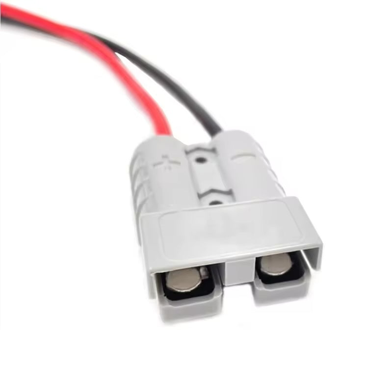 Close-up of Quick Connect 50A power plug housing and cable entry for industrial battery harness.