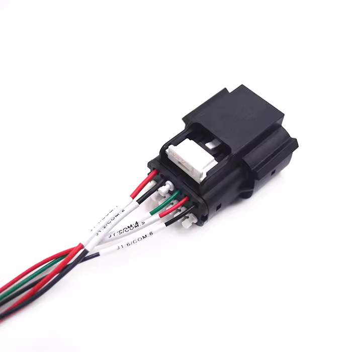 Industrial RS4-K12TY-AH-A 12-pin connector plug with blue weather seal for custom battery wire harness.